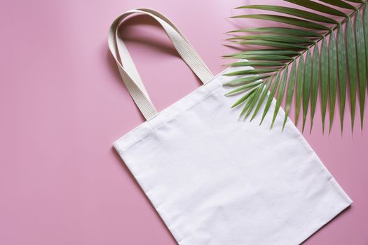 White tote bag canvas fabric. Cloth shopping sack mockup with copy space.