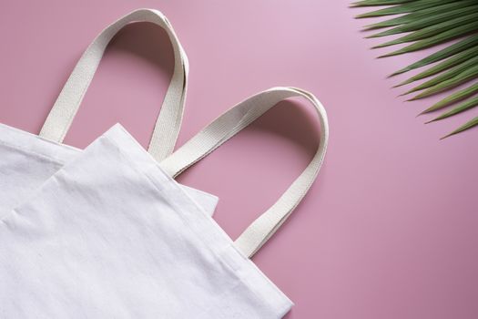 White tote bag canvas fabric. Cloth shopping sack mockup with copy space.