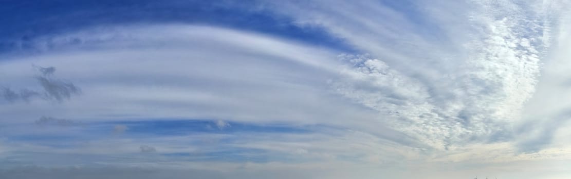 Stunning colorful sky panorama showing beautiful cloud formations in high resolution.