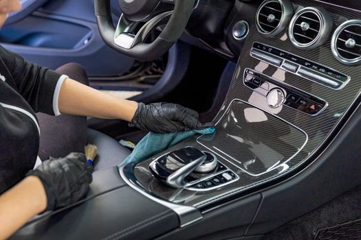 cleaning the interior of a luxury car with the help of chemistry with nanotechnology.