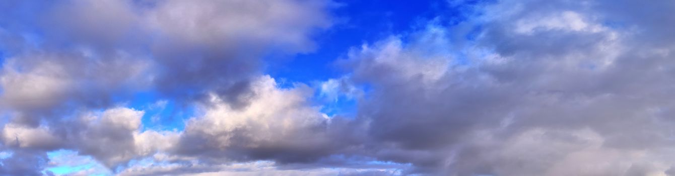 Stunning colorful sky panorama showing beautiful cloud formations in high resolution.