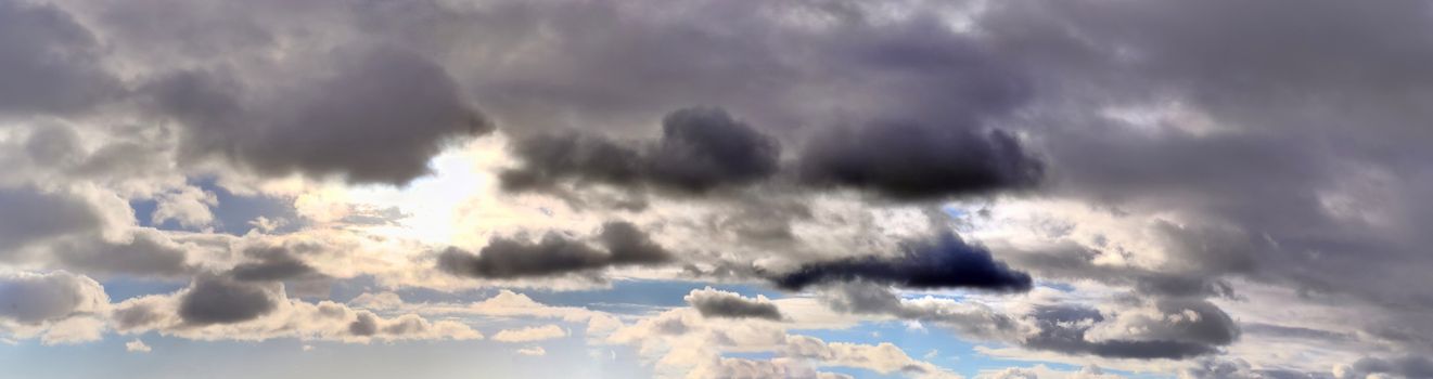 Stunning colorful sky panorama showing beautiful cloud formations in high resolution.