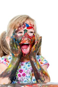 Close up portrait of Little girl with open mouth and painted face.Infant with dirty face shouting with hands on cheek. Isolated on white background.
