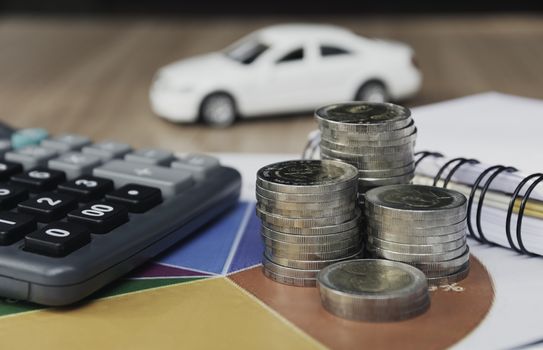 Car insurance and car service. Toy car for accounting and financial concept.