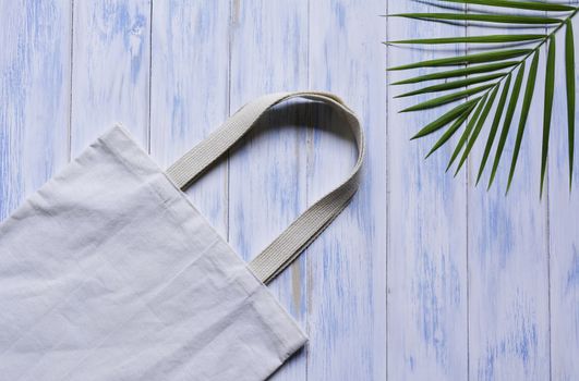 White tote bag canvas fabric. Cloth shopping sack mockup with copy space.
