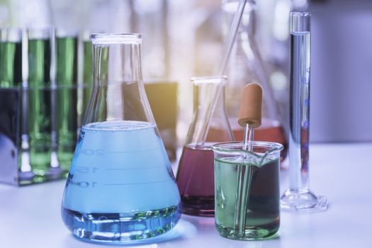 Glass laboratory chemical test tubes with liquid for analytical , medical, pharmaceutical and scientific research concept.