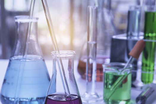 Glass laboratory chemical test tubes with liquid for analytical , medical, pharmaceutical and scientific research concept.