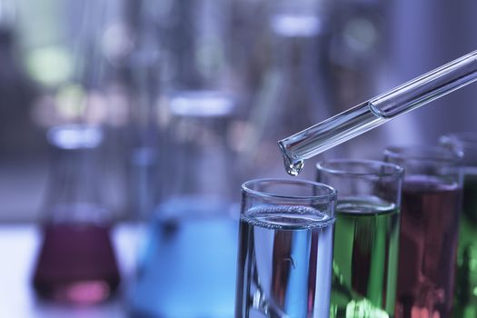 Glass laboratory chemical test tubes with liquid for analytical , medical, pharmaceutical and scientific research concept.