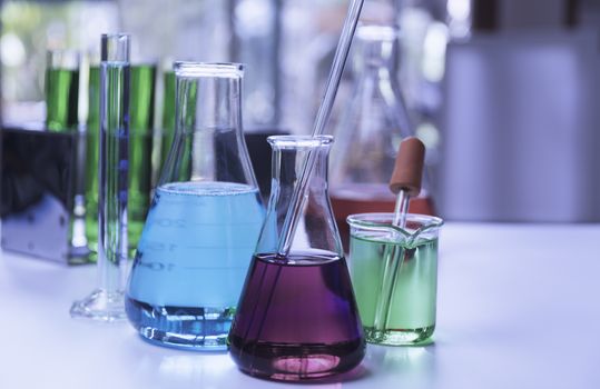 Glass laboratory chemical test tubes with liquid for analytical , medical, pharmaceutical and scientific research concept.