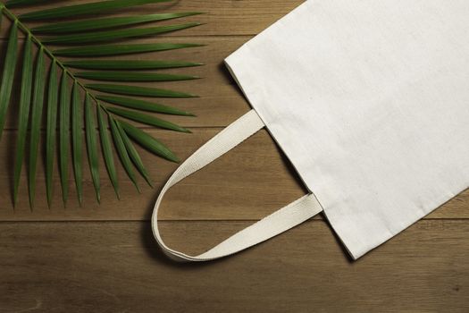White tote bag canvas fabric. Cloth shopping sack mockup with copy space.
