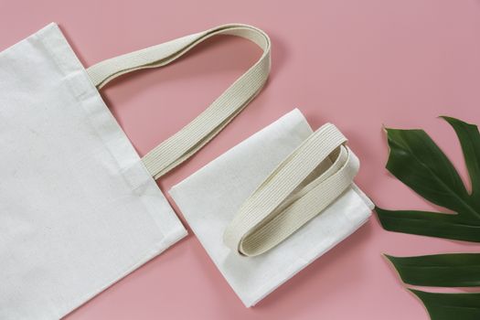 White tote bag canvas fabric. Cloth shopping sack mockup with copy space.