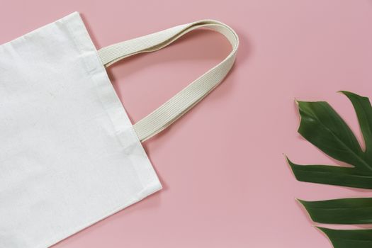 White tote bag canvas fabric. Cloth shopping sack mockup with copy space.