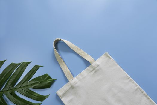 White tote bag canvas fabric. Cloth shopping sack mockup with copy space.