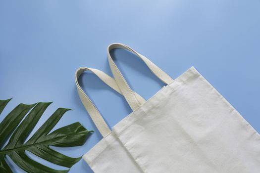 White tote bag canvas fabric. Cloth shopping sack mockup with copy space.