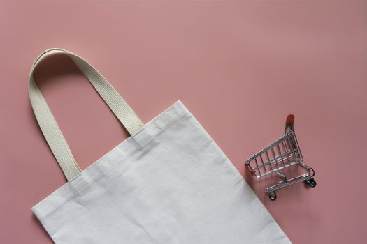 White tote bag canvas fabric. Cloth shopping sack mockup with copy space.