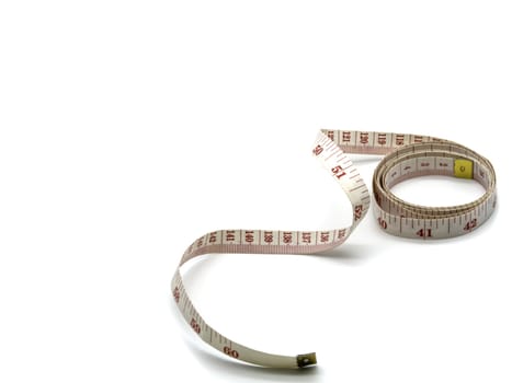 A soft tailor measuring tape isolated on a white background with copy space.