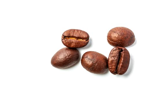 A spread coffee beans isolated on white background and copy space