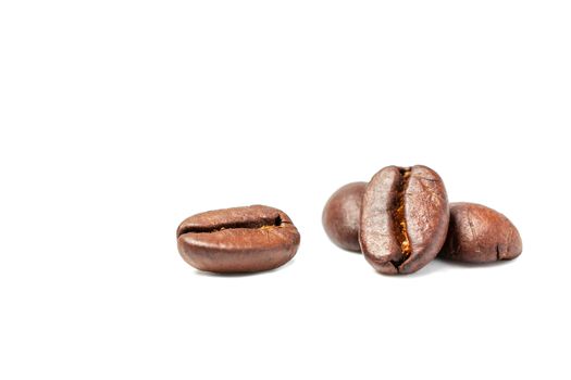 A spread coffee beans isolated on white background and copy space