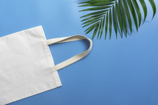 White tote bag canvas fabric. Cloth shopping sack mockup with copy space.