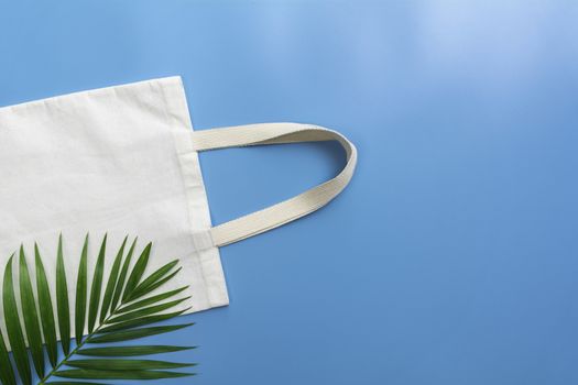 White tote bag canvas fabric. Cloth shopping sack mockup with copy space.