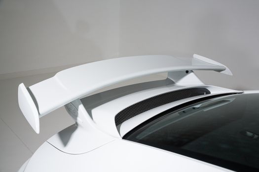 Isolated shot of rear spoiler on sports car