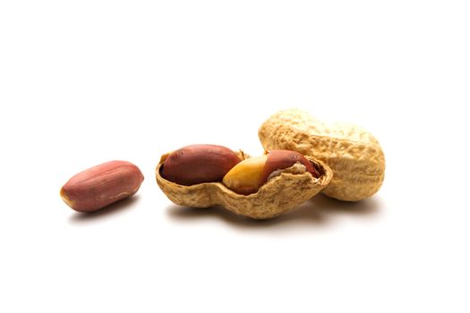 Peanut in a shell isolated on white background. Dried peanuts in closeup.