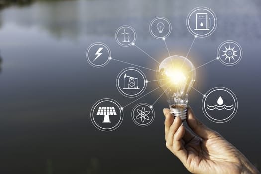 Innovation and energy concept of hand hold a light bulb and copy space for insert text.