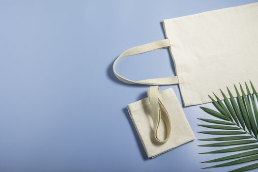 White tote bag canvas fabric. Cloth shopping sack mockup with copy space.