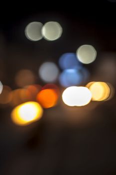 Close up of bokeh background of traffic lights during sunset.