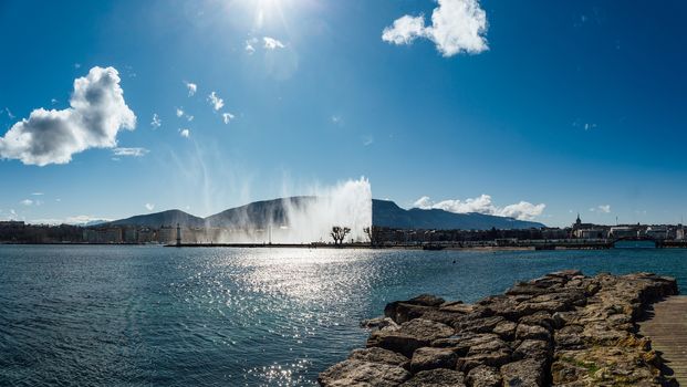 Geneva city center, lake and fountain on a sunny spring day.