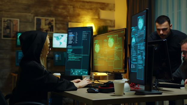 Hacker girl stealing information from people using dangerous virus.
