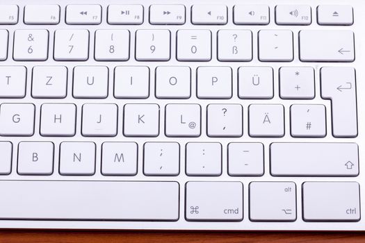 White aluminum keyboard in close up. Technology and communication