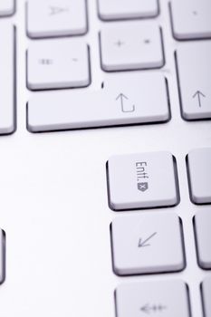 White aluminum keyboard in close up. Technology and communication