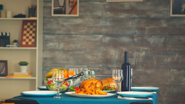 Delicious baked chicken on the table for family dinner.