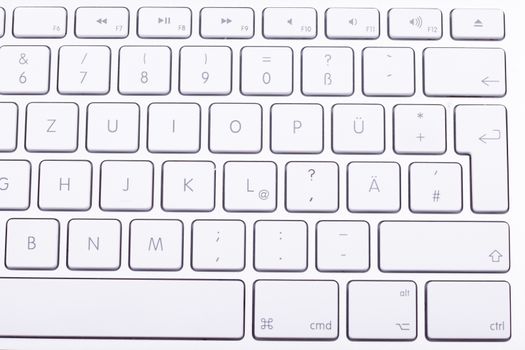 White aluminum keyboard in close up. Technology and communication