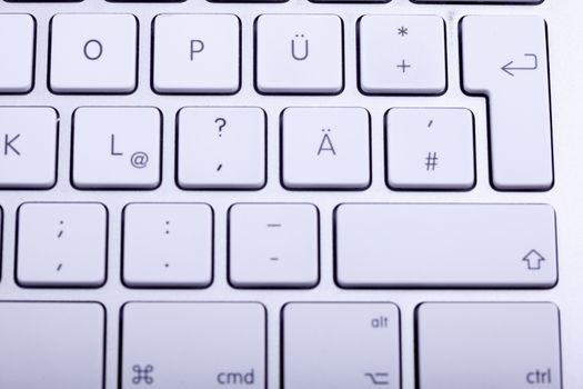 White aluminum keyboard in close up. Technology and communication