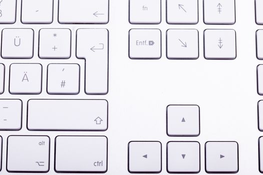 White aluminum keyboard in close up. Technology and communication