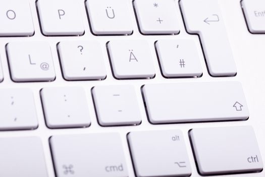 White aluminum keyboard in close up. Technology and communication