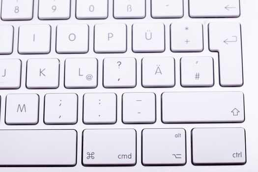 White aluminum keyboard in close up. Technology and communication