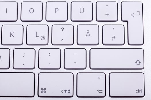 White aluminum keyboard in close up. Technology and communication