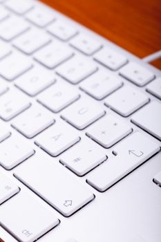 White aluminum keyboard in close up. Technology and communication