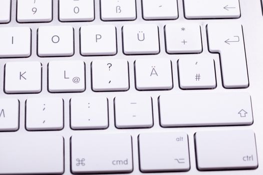 White aluminum keyboard in close up. Technology and communication