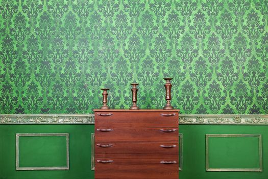 Green vintage interior with rococo pattern background. Rich interior. Luxury lifestyle