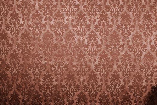 Brown vintage pattern on old wall. Rich vintage retro pattern interior