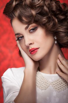 Beautiful sensual model. Toned vintage portrait. Professional make up and hairstyle. Studio shooting