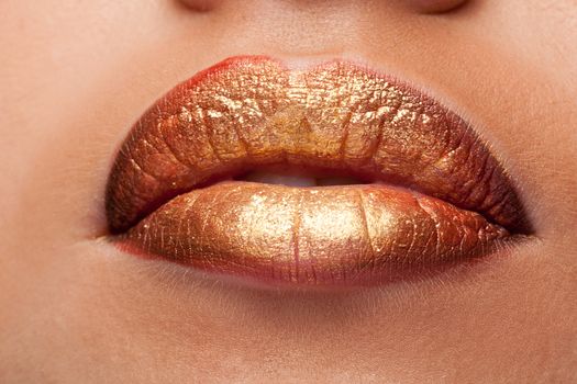 Close up of lips with lipstick on them in studio photo