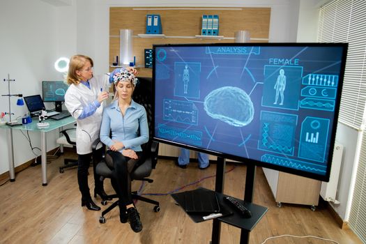 Screen showing brain activity during scanning procedures. Neurological lab