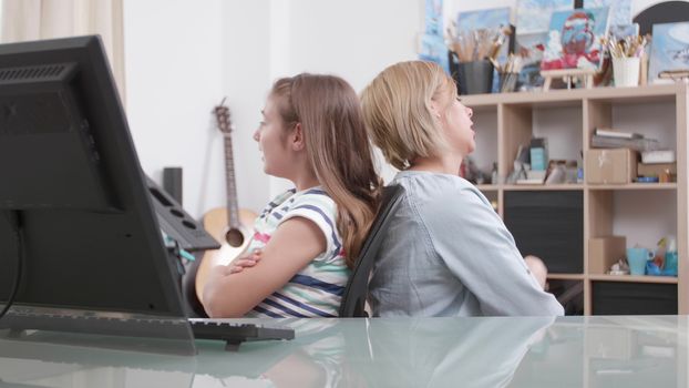 Mother rebukes her young teenage daughter because of her irresponsability. Mom and her young girl trying to solve a conflict.