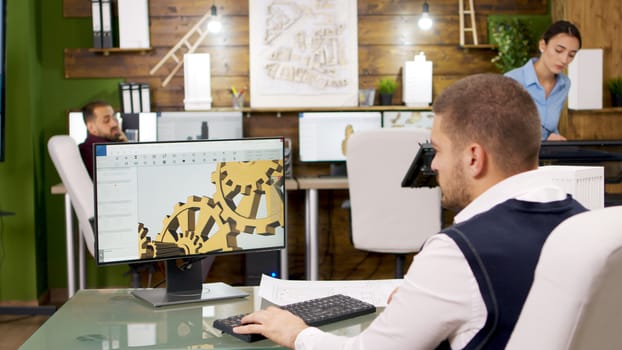 Construction engineer working on building mechanics on computer. Architect working on computer.