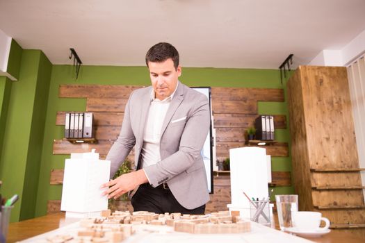Young architect in a conference room working a new real estate project